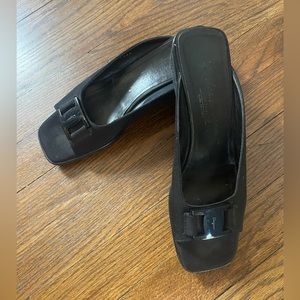 Ferragamo black slip on shoes . Beautiful fabric with wedge heels.